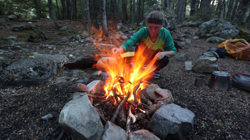 Stoking the Fire at Bush Line Bog Camp