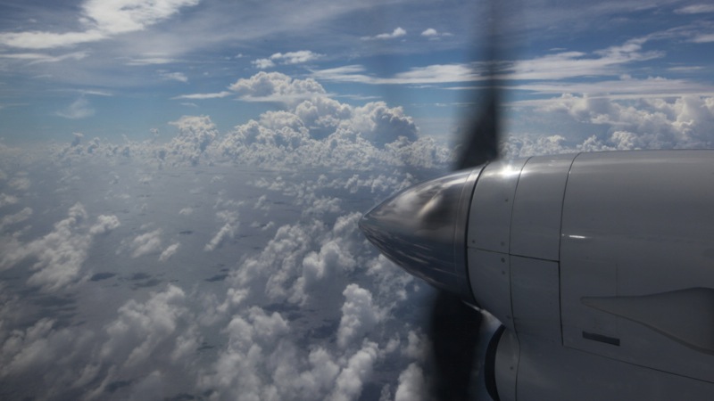 Flying over the Pacific (propeller out of window)