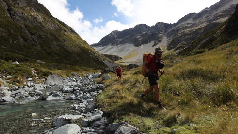 Cookie and Nicky walking down the first trickle of Waiau River